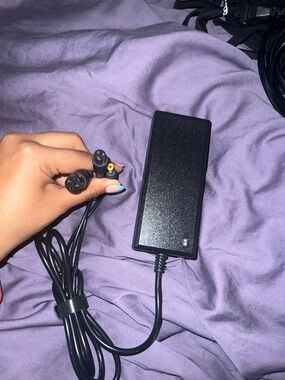 Universal Black AC Power Adapter with Multiple DC Tips